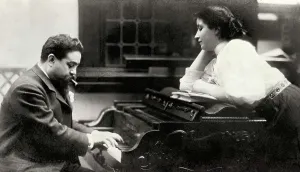 Musics Prints: ALBENIZ, Isaac (1860-1909). Portrait of Isaac Albeniz on the piano with his younger daughter Laura (1908)