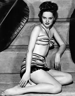 Smith Prints: Alexis Smith, who has just been voted easiest to record on film by sound technicians