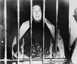 Mexicans Prints: Alfaro Siqueiros (1896-1974), peering from behind bars in a Mexico City jail