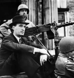 Troops Prints: Alfred Krupp sits in the rear seat of a jeep as he is taken away by American troops for questioning