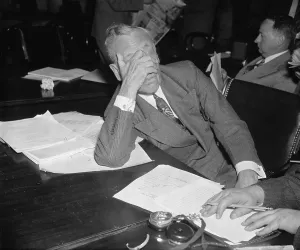 Industrialists Prints: Alfred P. Sloan 1875-1966 chairman of General Motors covered his face with his hand during his testimony before