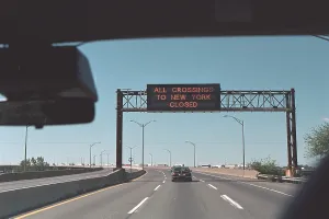 Lcgr1507 Prints: All Crossings to New York Closed reads a highway sign on Sept. 11, 2001