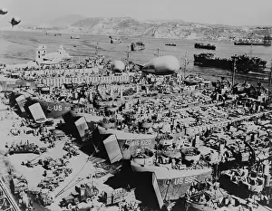 Allies Prints: Allied invasion ships in a southern Italian port being loaded with vehicles and supplies
