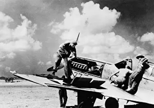 Libyan Prints: Allies in the Libyan desert. Feeding bullets into a Curtiss P40F Warhawk