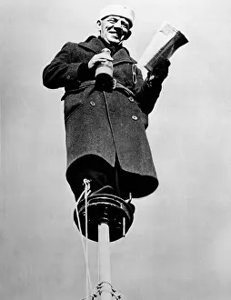 Records Prints: Alvin Shipwreck Kelly top a flagpole near College Park