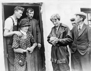 Flight Suit Prints: Amelia Earhart (1897-1937), with Mr. & Mrs. Laughlin (left), in Culmore, Northern Ireland