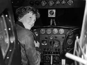 Everett Site Prints: Amelia Earhart in her Lockheed L-10E Electra prepares for 27