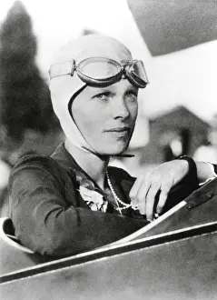Flyers Prints: Amelia Earhart, record breaking women aviator in the cockpit of her plane