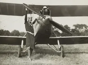 Flyers Prints: Amelia Earhart, turning the propeller of the sports plane she bought in 1928