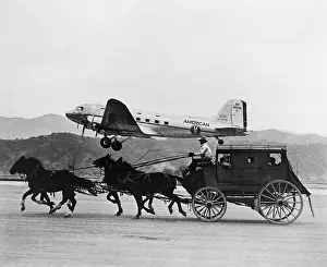 Lcgr1511 Prints: American Airlines DC-3 flying past horse drawn stagecoach
