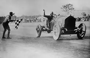 Speed Prints: American driver Joe Dawson, crosses the finish line of the Indianapolis 500 automobile race