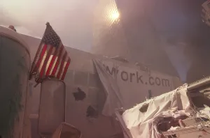 2000s Prints: American flag planted in the rubble of World Trade Center after 9-11 terrorist attacks
