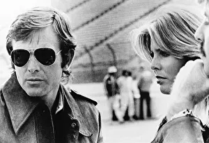 Girlfriend Prints: American racing driver Peter Revson with model Marjorie Wallace at the Ontario Speedway