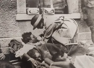 Patient Prints: American Red Cross nurse aiding wounded soldiers at Montmirail, France, May 31, 1918