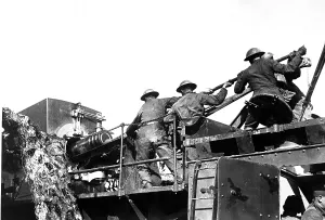 Anonymous Group Portraits Prints: Four American soldiers loading a mobile railroad gun