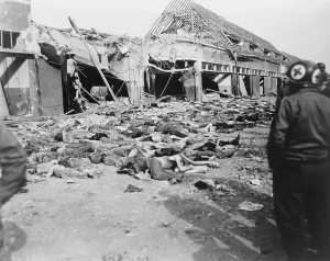 Liberation Prints: American soldiers look at the long rows of bodies at Nordhausen concentration camp