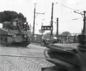 Capitals Prints: American tanks of the Fifth Army passing big signs for Roma at edge of the city
