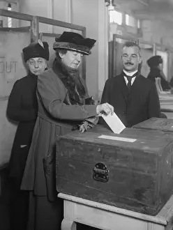 19th Amendment Prints: American woman votes, ca. 1920