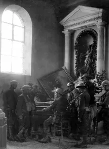 Wreckage Prints: American World War I soldiers listen as one of their comrades plays the organ in the half-wrecked old church