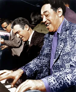 Playing Piano Prints: ANATOMY OF A MURDER, from left: James Stewart, Duke Ellington, on set, 1959