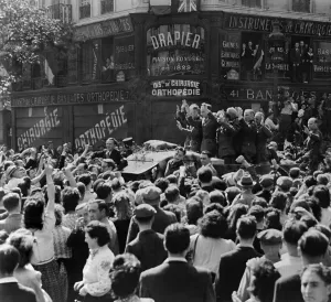 Liberation Prints: Angry Parisians raise clenched fists at Nazi officers in a Free French Forces truck