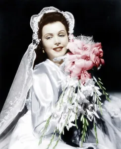 Wedding Dress Prints: Ann Miller models a wedding ensemble, 1941