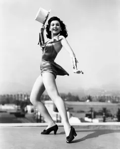 Top Hat Prints: Ann Miller, rehearsing atop the Columbia sound stages for REVEILLE WITH BEVERLY, 1943