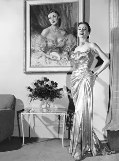 At Home Prints: Anne Jeffreys, relaxing at home in a $2, 700 gown, 1953