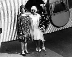 Lindbergh Prints: Anne Lindbergh and Mary Pickford taking part in the christening ceremonies of tri-motored plane to be flown by Charles
