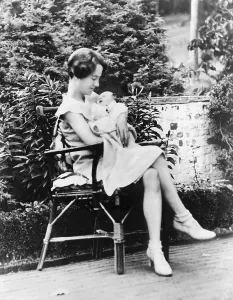 Kidnappings Prints: Anne Morrow Lindbergh in 1930, holding her first son