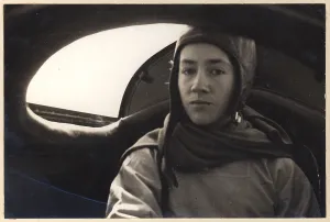 Lindbergh Prints: Anne Morrow Lindbergh inside the rear cockpit of the modified Lockheed Sirius during the Arctic air-route survey