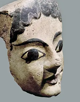 6th C Prints: Antefix with a female head. 6th c