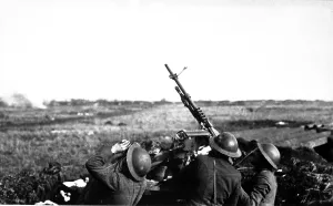 Anti-aircraft machine gun of 101st Field Artillery firing on a German observation plane at Plateau Chemin des Dames, France. World War I. March 5, 1918