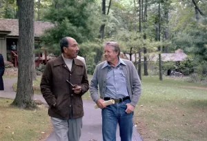 August Prints: Anwar Sadat and Jimmy Carter walking at Camp David during the summit meeting that resulted in the Camp David Accords