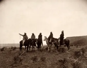 Curtis Prints: Apaches. The lost trail- Five Apache on horseback in the desert