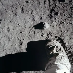 Spacesuits Prints: Apollo 11 astronaut boot and boot print on the surface of the Moon. July 20, 1969