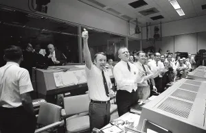 Accident Prints: Apollo 13 Flight Directors applaud the successful splashdown of the Command Module