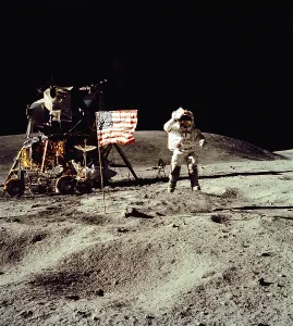 Salute Prints: Apollo 16 Astronaut salutes the US flag on the Moon. July 21-24, 1971
