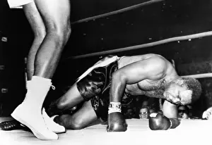 Csubeta Prints: Archie Moore on the canvas in the fourth round of his fight with 20 year old Cassius Clay