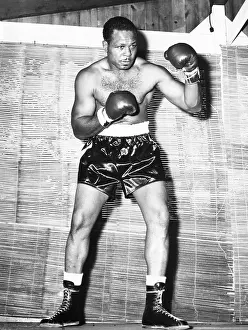 Trunks Prints: Archie Moore at Kenwood Camp, while training for his match with Rocky Marciano
