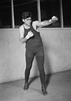 Champions Prints: Argentinian Boxer Luis Angel Firpo knocked Jack Dempsey out of the ring on Sept