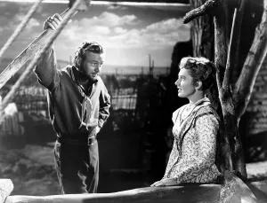 Print Dress Prints: ARIZONA, from left: William Holden, Jean Arthur, 1940
