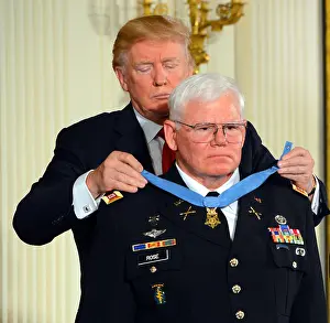 Rose Prints: Army Capt. Mike Rose receives the Medal of Honor from President Donald Trump
