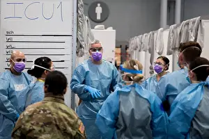 Doctors Prints: Army Maj. Sean Shirley, holds a staff meeting at the Javits New York Medical Station intensive care unit