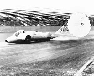 Parachutes Prints: Art Arfons on the Thompson Raceway dragstrip opens twin parachutes to decelerate speed
