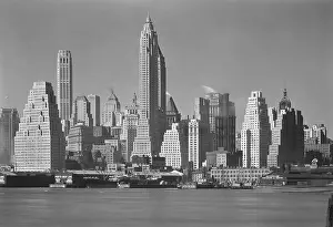 Port Prints: Art Deco style skyscrapers dominate Lower Manhattan's East River skyline in 1932