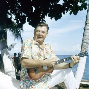 Ocean Prints: Arthur Godfrey, playing the ukulele, April 1963