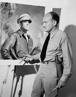 Naval Officer Prints: Artist McClelland Barclay with his portrait of General Douglas MacArthur during World War II