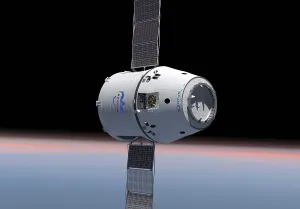 Satellites Prints: Artist's concept of the first Dragon Space capsule in orbit