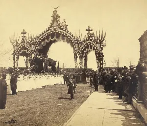 Mourning Prints: Assassinated President Lincoln's hearse is accompanied by women dressed in white as it passes beneath an ornate
